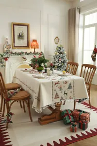 Christmas holiday tablecloth detailed scene with festive jacquard pattern and tassel decor.