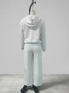 Detailed view of the grey hooded zip-up sweatshirt and wide-leg trousers casual suit back display.