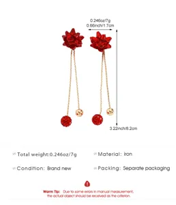 Red bow and studded long drop earrings detail view showing dimensions, weight, and material specs.