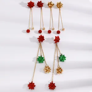 Christmas 3D bow long tassel earrings with red, green and gold elements for holiday party.