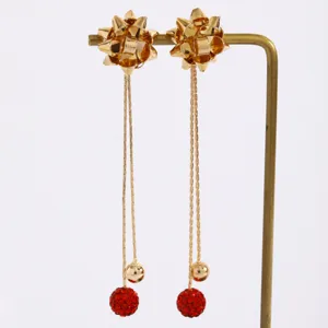 Christmas ribbon bow long tassel earrings with glittering red crystal balls for holiday party.