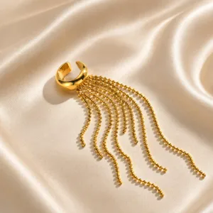 Gold stainless steel non-pierced ear cuff featuring delicate beaded tassel detail, elegant jewelry.