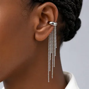 Silver stainless steel ear cuff with long beaded tassel chains, clip-on design for non-pierced ears.
