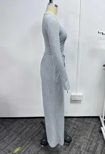 Side detail view of women casual gray long sleeve top and matching pants lounge set.