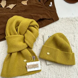 Women's yellow knit beanie and scarf two-piece set, winter warm thick woolen hat and long scarf.