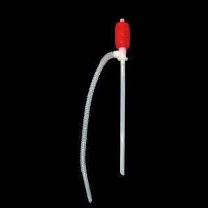 Manual siphon pump with a red squeeze bulb, clear straight tube and corrugated hose on black