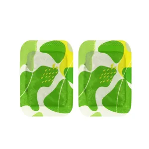 Pair of disposable self-heating hand warmer patches with rounded edges and green floral prints