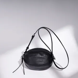 Women Fashion Vegetable Tanned Sheepskin Balloon Bag Unique Rugby Shape Shoulder Crossbody Bag Versatile Commute Daily Handbag