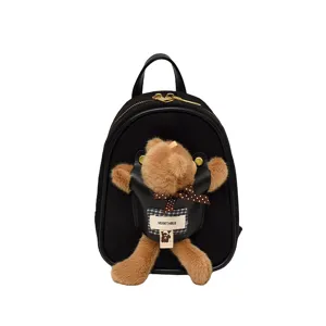 Small black casual backpack with a fluffy brown bear charm and plaid label on the front