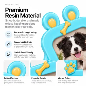 Close-up details of a glossy blue resin pet photo frame with yellow bone and paw-print accents