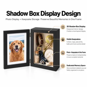 Open black display frame showing a dog photo beside a deep compartment filled with keepsakes