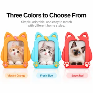 Three colorful cat-shaped photo frames in orange, blue, and red, each displaying a kitten portrait