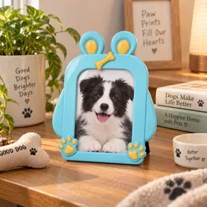 Blue pet photo frame with a dog portrait, playful ear-shaped top and yellow paw accents