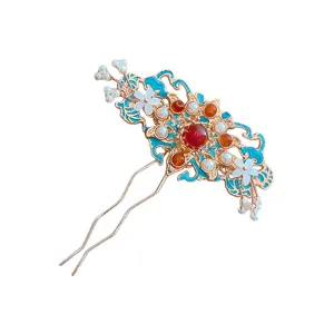 Chinese-style gold hairpin with blue enamel, red gems and pearl accents, shown on a white background