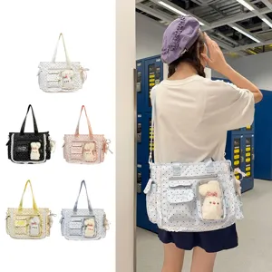 Plusieurs coloris, sac à pois porté avec bordure en dentelle et poche transparente pour breloque