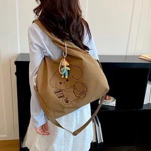 Sac Cabas en Toile Imprimé Chien de Dessin Animé pour Femmes Grande Capacité Style Japonais Sac à Bandoulière Étudiants Avec Porte-clés Poupée