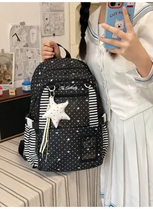Sac noir à motifs d’étoiles et de pois, côtés rayés, poche transparente et breloque étoile