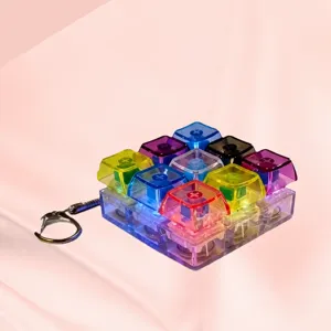 Porte-clés Jouet Fidget Touches de Clavier Mécanique Matrice à Neuf Touches Jouet de Décompression Avec Lumière Colorée Son Pendentif de Bureau