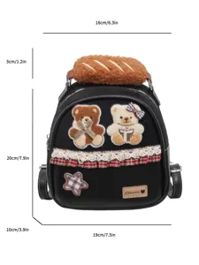 Front detail of bear patches, plaid lace trim and plush bread-shaped handle on black bag