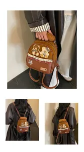 A brown bag shown in hand and from behind, with bear appliqués, plaid lace trim, and a plush charm