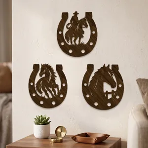 Three dark brown horseshoe wall ornaments with cowboy, galloping horse and horse head cutouts
