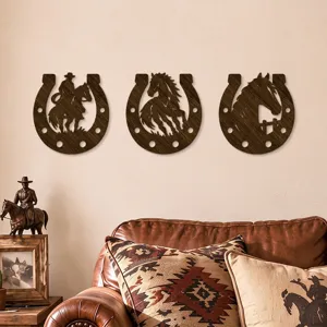 Three dark wood horseshoe plaques with cutout cowboy, running horse, and horse head designs