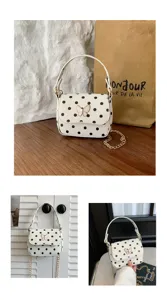 White bag with black polka dots and a butterfly clasp, shown with its chain strap in lifestyle views