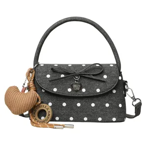 Borsa da donna nera effetto denim a pois bianchi, con fiocco sul davanti, manico e tracolla