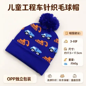 Navy knit beanie for children with pom-pom, orange excavators, blue trucks and folded ribbed cuff