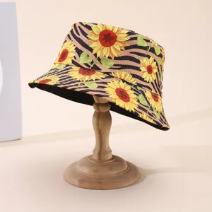 Hat on a wooden stand with sunflower, green heart-leaf and striped fabric pattern