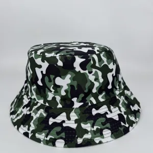 Front view of a green, white and black camouflage bucket hat with a rounded crown and stitched brim