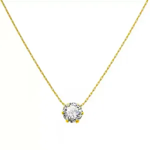 Gold-tone necklace with a fine chain and a clear round-cut crystal pendant in a six-prong setting