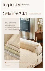 Close-up of textured sofa covers with raised dots, stripes and pom-pom trim in soft neutral shades