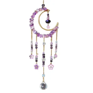 Purple amethyst crescent moon sun catcher with gold chains, flower beads and a clear crystal ball