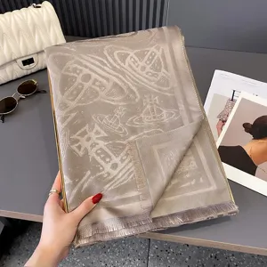 Beige-camel Jacquardschal als Tuch mit Planetenmotiven, feinem Goldrand und Fransen