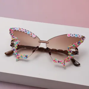 View of brown gradient lenses with colorful candy-like beads and BIRTHDAY GIRL letter details