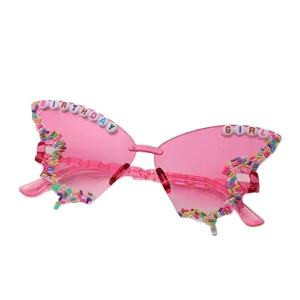 Pink butterfly party sunglasses with tinted lenses, colorful bead trim and birthday lettering