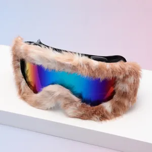 Close-up showing the soft brown-and-white faux fur trim and vibrant blue-purple mirrored lens