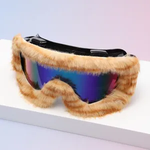 Faux-fur-trimmed goggles with a black frame and colorful mirrored lens, displayed on white