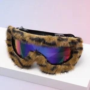 Leopard-print faux-fur trim frames colorful mirrored lenses, shown on a white display stand