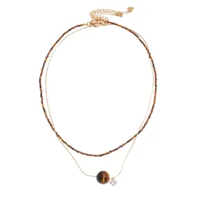 Collana doppia con perline occhio di tigre, catena dorata, pietra tonda e ciondolo in zircone