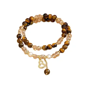 Bracciale doppio giro in occhio di tigre, cristalli, perle e ciondolo dorato a forma di zucca
