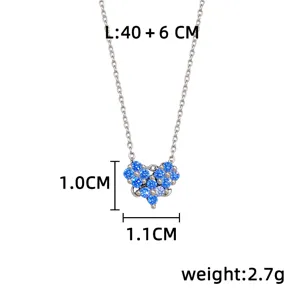 Silver chain with blue heart-shaped pendant, shown with length and pendant size measurements
