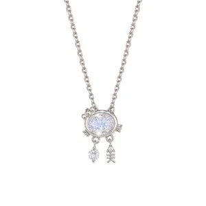 Silver-tone cat pendant necklace with a white oval faux gem, dangling crystal and character charm