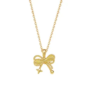 Gold-tone titanium steel necklace with a woven bow pendant, tiny star and bead accents