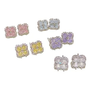 Silver-tone four-leaf clover studs with pink, blue, purple, yellow and clear zircon stones