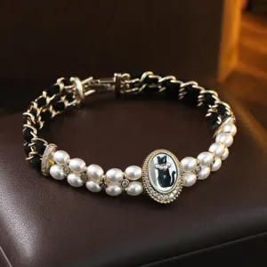 Vintage Französischer Palaststil Schwarze Katze Relief Künstliche Perle Samt Nähte Kupfer Vergoldet Strass Armband Für Damen