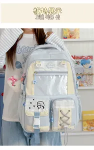 Front view highlighting the clear display window, layered pockets, star charm and buckle details