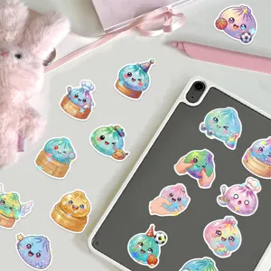 Colorful holographic cartoon stickers scattered over a tablet, with sparkling glitter details