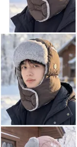 Retrato de un gorro de invierno marrón, con forro de pelo sintético gris y botón metálico lateral